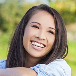 Young smiling woman outdoors