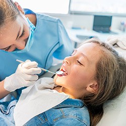 Child receiving dental care