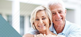 Smiling senior couple outdoors