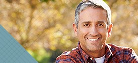 Man with whole healthy smile outdoors