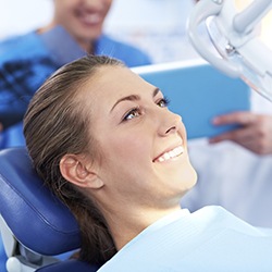 Smiling woman in dental chair